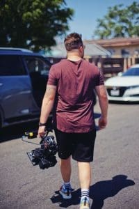carrying a camera