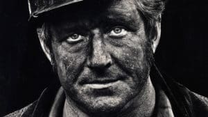 Coal miner Lee Hipshire in 1976, shortly after emerging from a mine in Logan County, W.Va. at the end of his shift. At age 36, he had worked 26 years underground. A few years later, Lee took early retirement because of pneumoconiosis, or black lung disease. He died at 57.