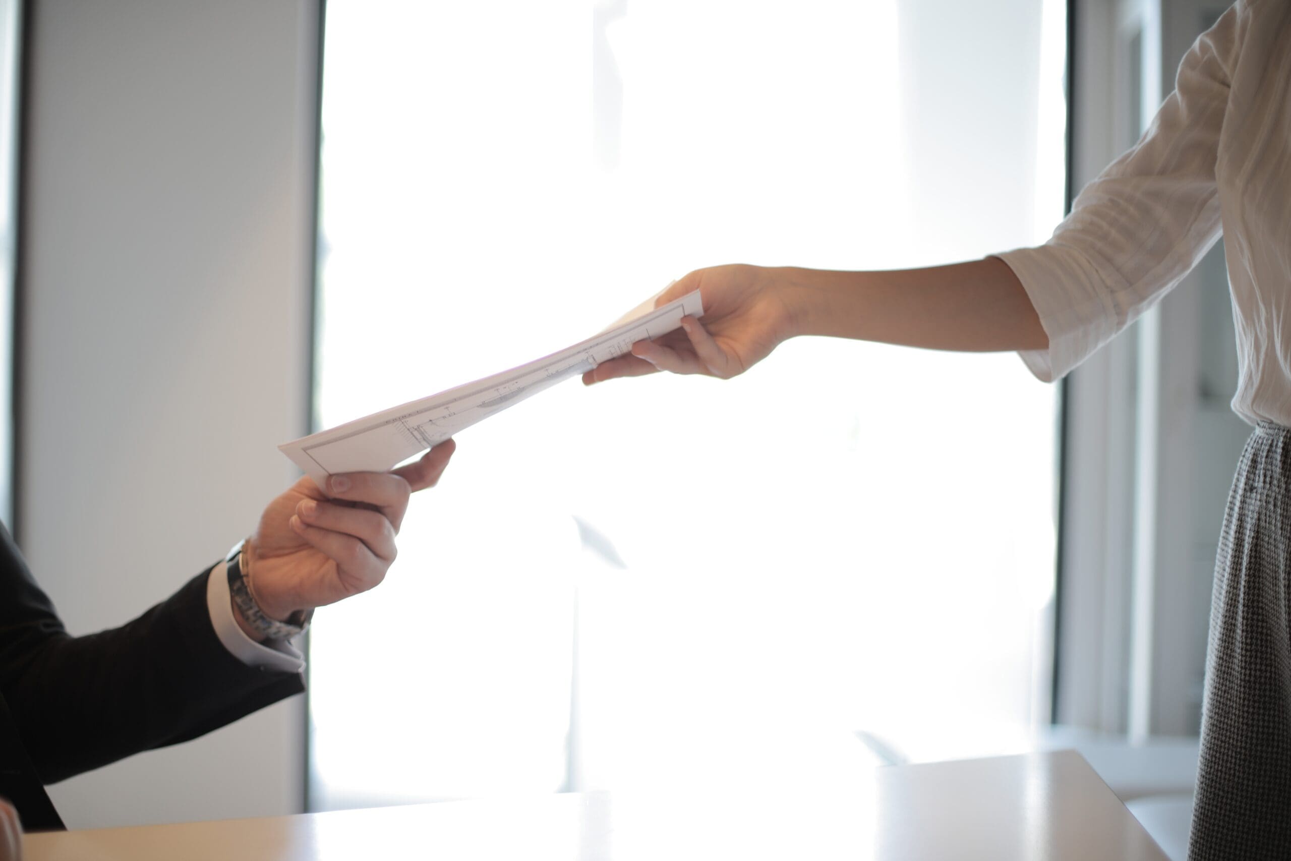 giving a resume to someone